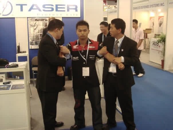 Live arm-control demonstration with attendees at the TASER booth